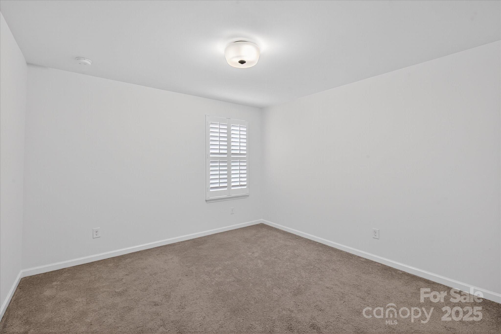 7481 Hartsfield Drive Lancaster, SC 29720 - Photo 32 of 47 an empty room with a window