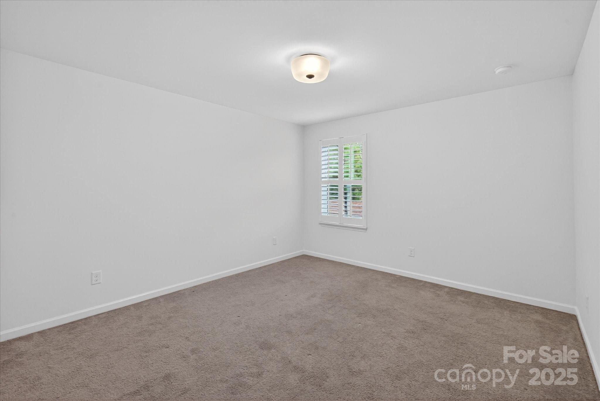 7481 Hartsfield Drive Lancaster, SC 29720 - Photo 34 of 47 an empty room with windows
