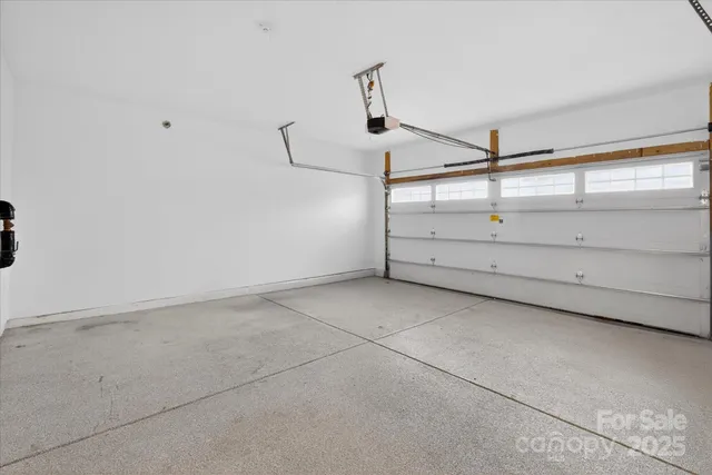 a front view of a building with garden