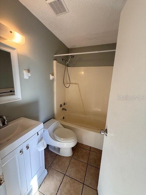 11090 Pendleton Avenue, Unit B Englewood, FL 34224 - Photo 6 of 10 a bathroom with a granite countertop sink toilet and shower