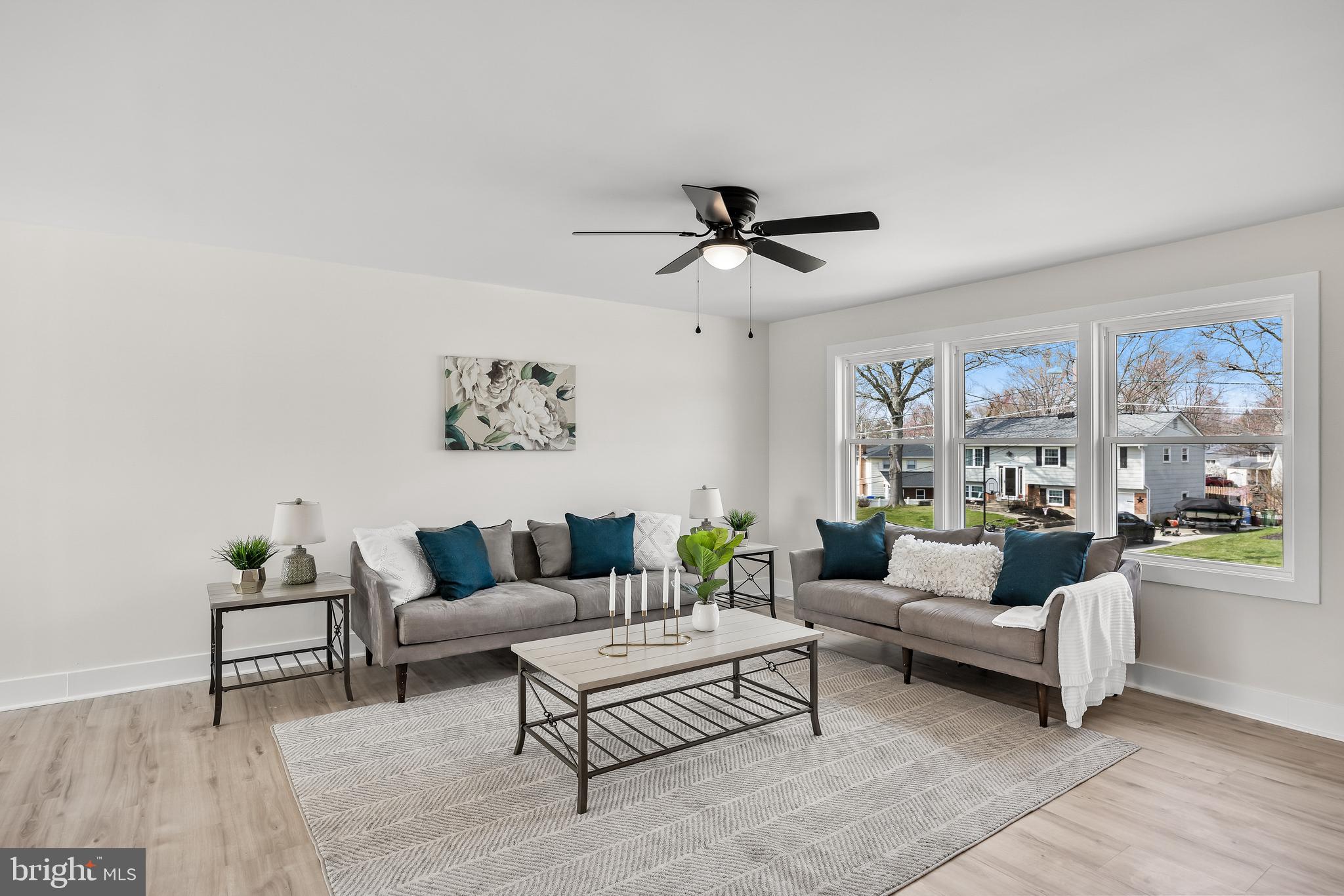 10 Cobblestone Road Cherry Hill, NJ 08003 - Photo 3 of 15 a living room with furniture and a large window