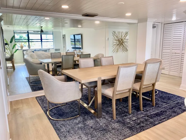 a view of a dining room with furniture