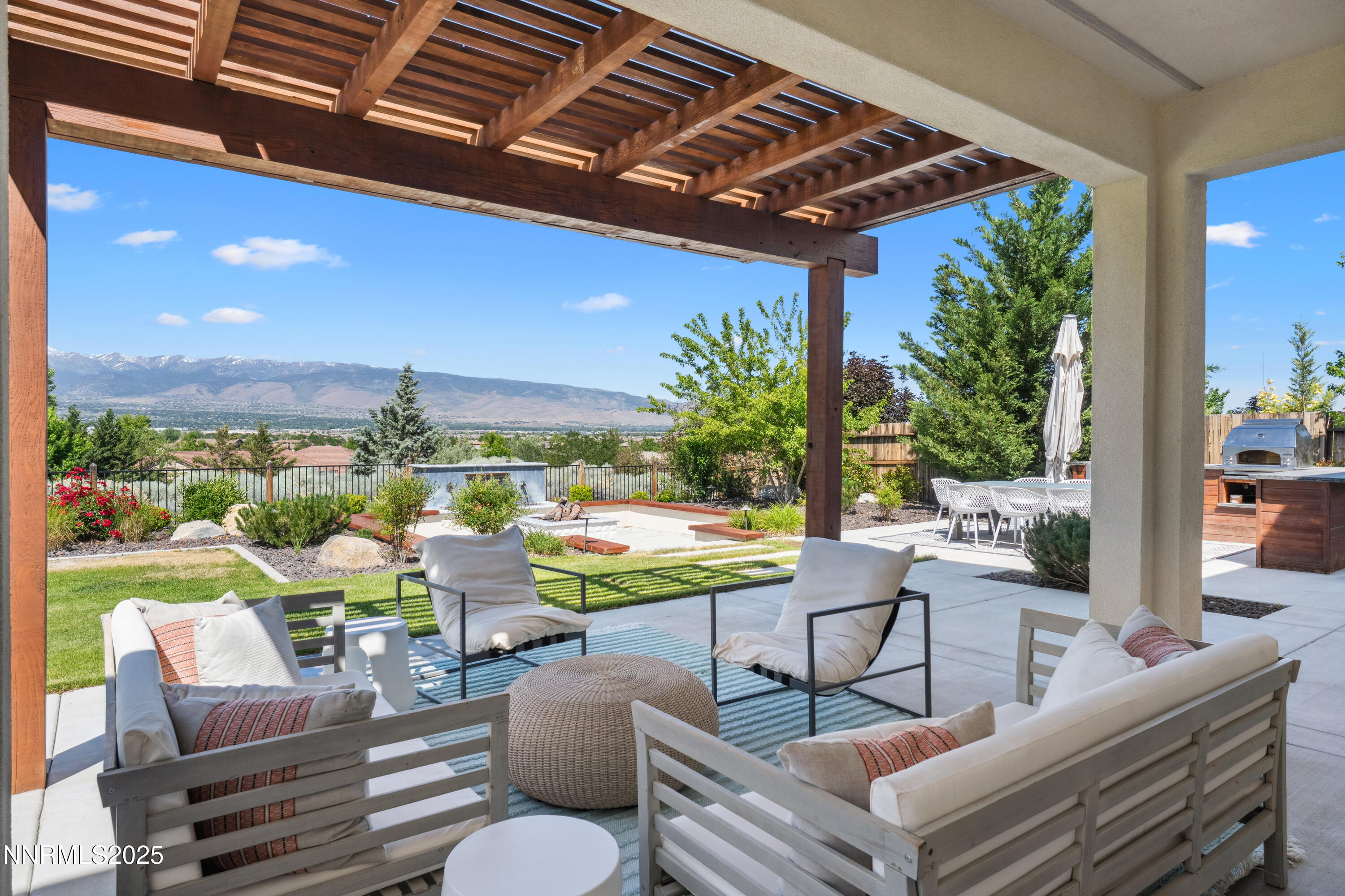 2780 Trail Rider Drive Reno, NV 89521 - Photo 11 of 54 a view of a patio with chairs and a table
