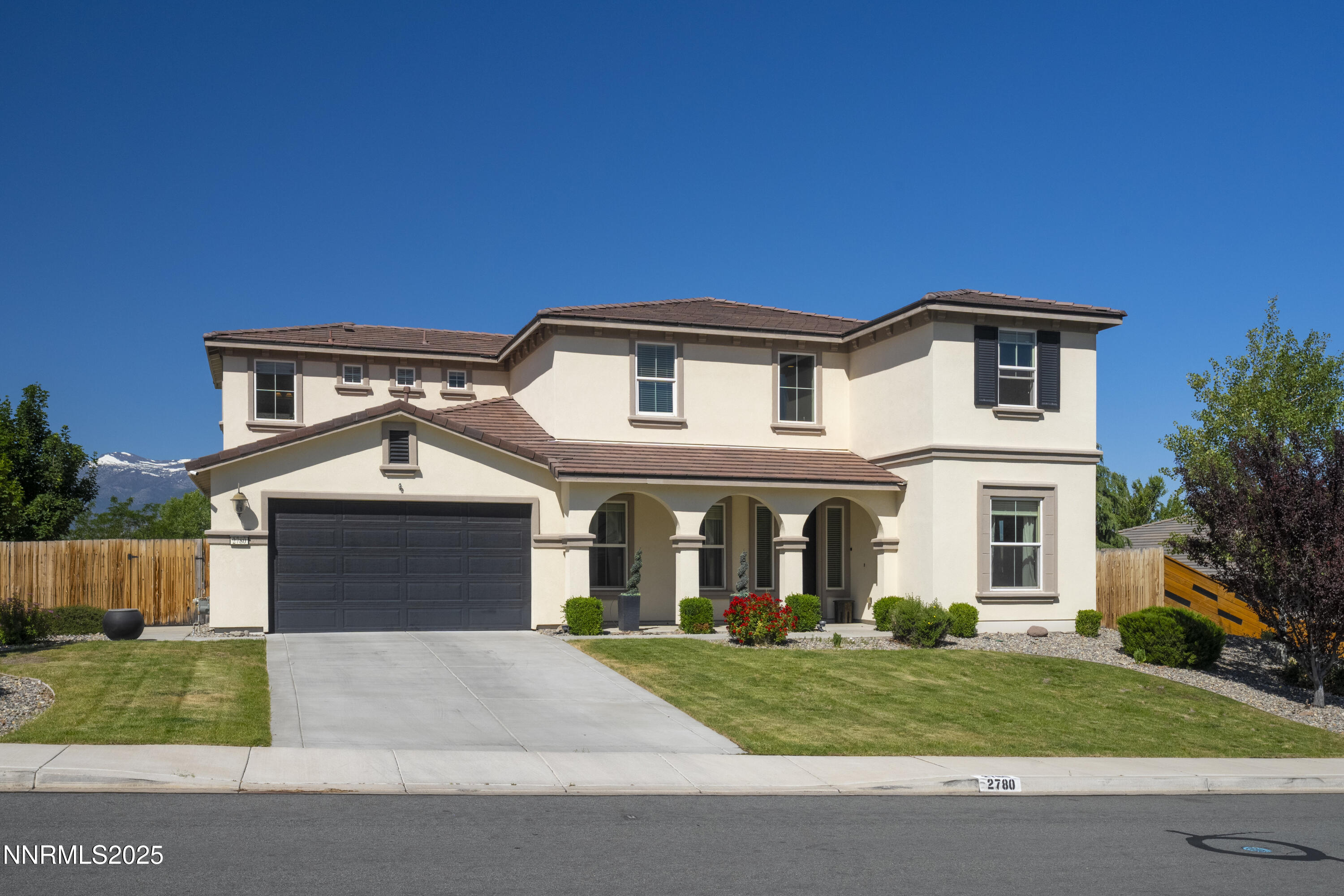2780 Trail Rider Drive Reno, NV 89521 - Photo 54 of 54 a front view of a house with a yard