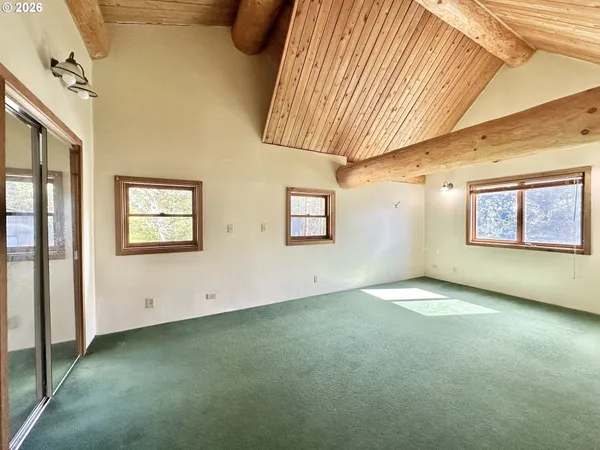 an empty room with windows