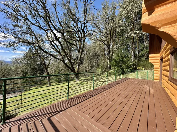 a view of wooden deck with a bench