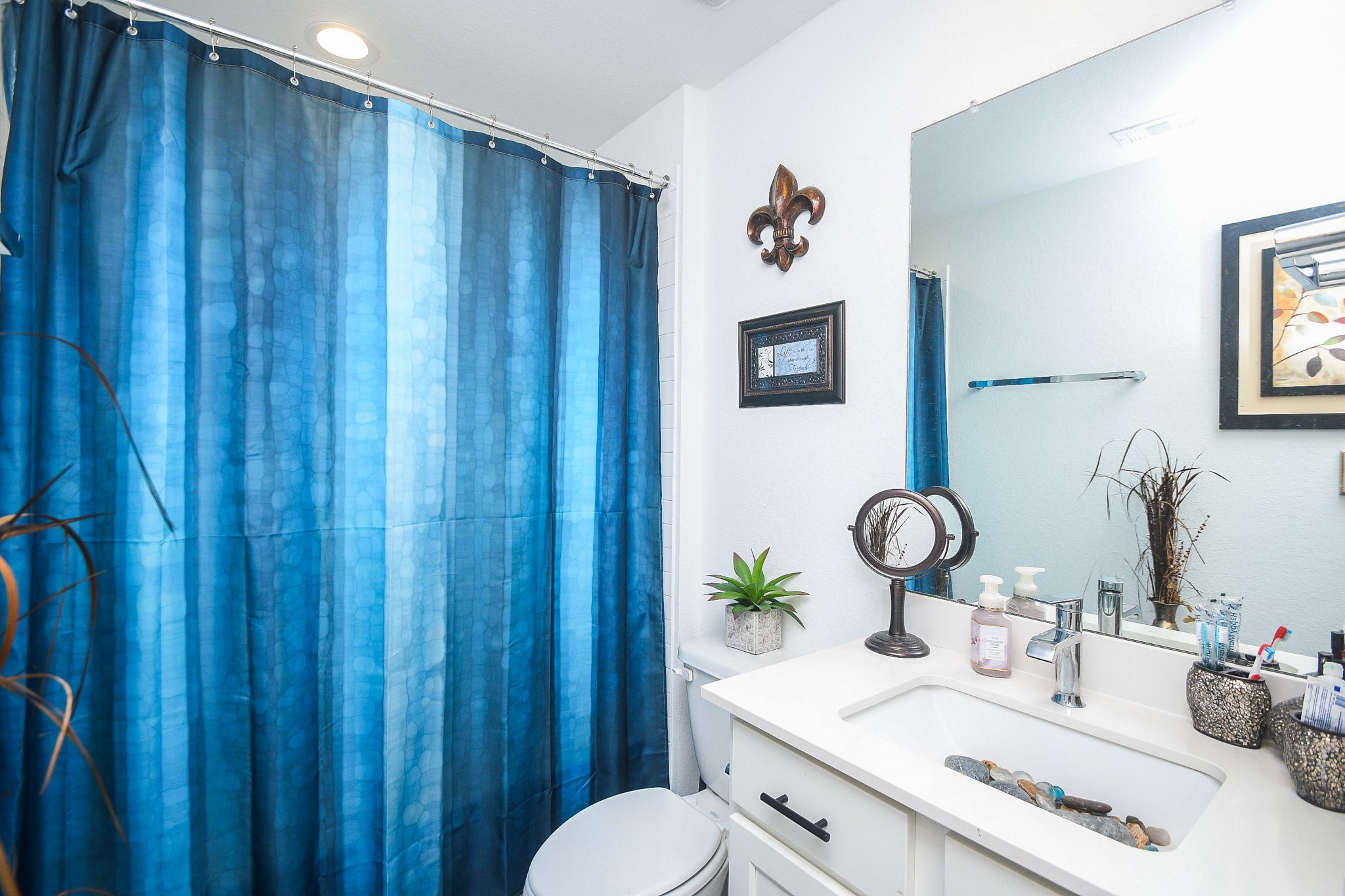 7723 Golden Rubia Lane Rosharon, TX 77583 - Photo 24 of 34 a bathroom with a sink vanity and mirror