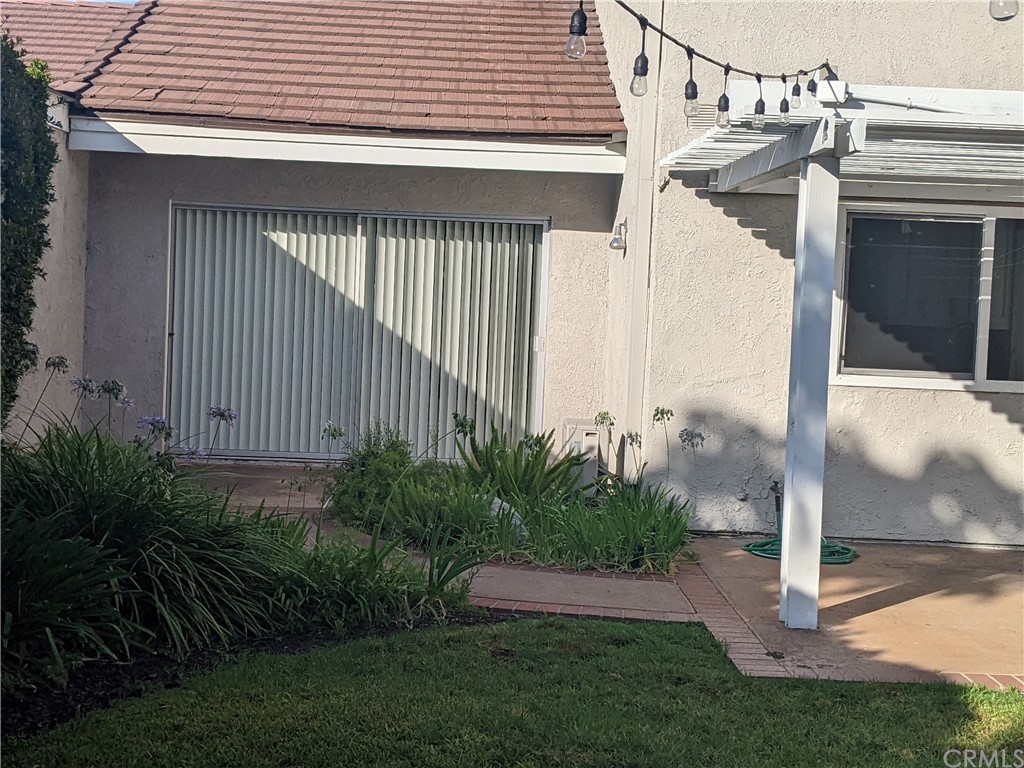 633 North Buttonbush Trail Orange, CA 92869 - Photo 25 of 26 a front view of a house with garden