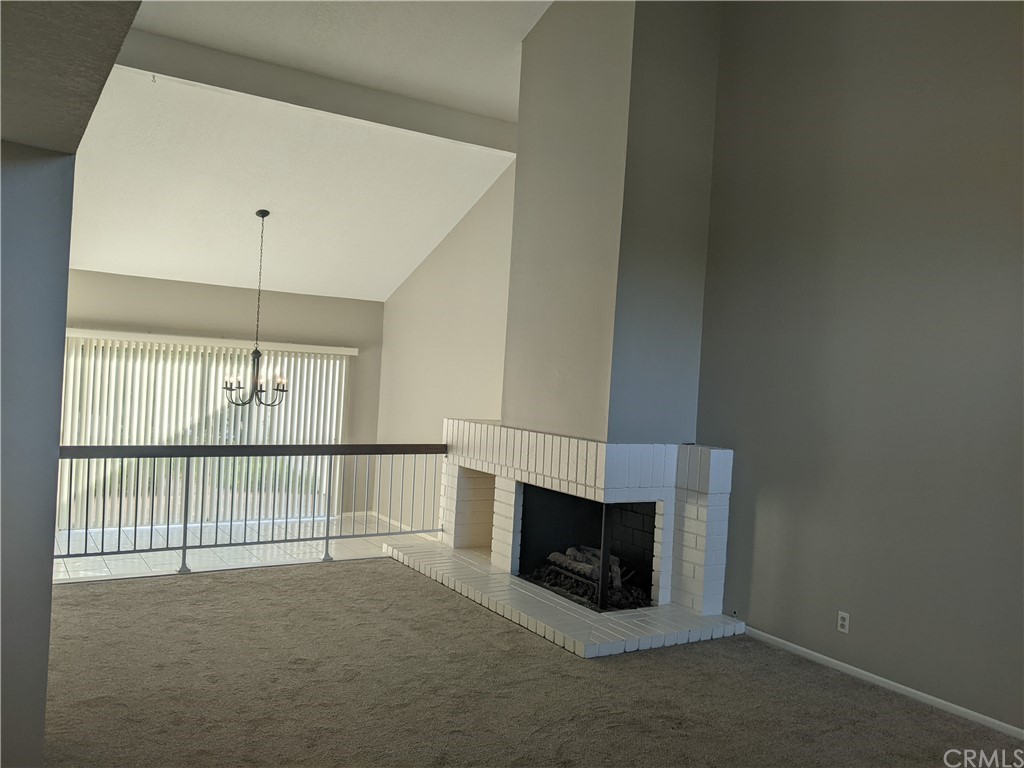 633 North Buttonbush Trail Orange, CA 92869 - Photo 8 of 26 a view of empty room with fireplace