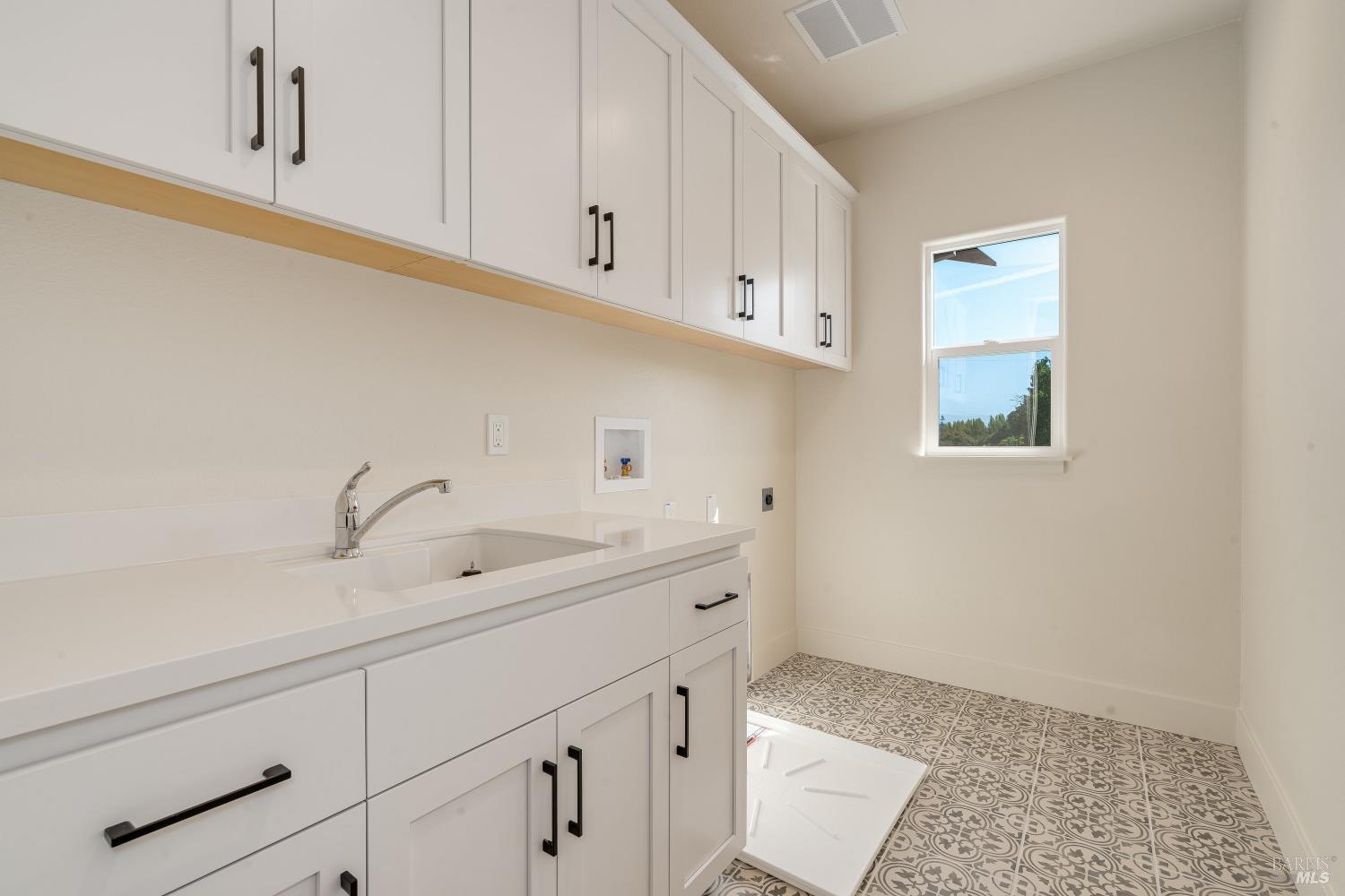 3461 Ruston Lane Napa, CA 94558 - Photo 10 of 22 a bathroom with a sink and a mirror