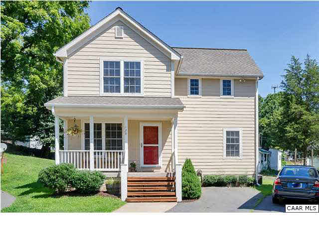128 Roy's Place Charlottesville, VA 22902 - Photo 1 of 16 a view of a house with a yard and plants