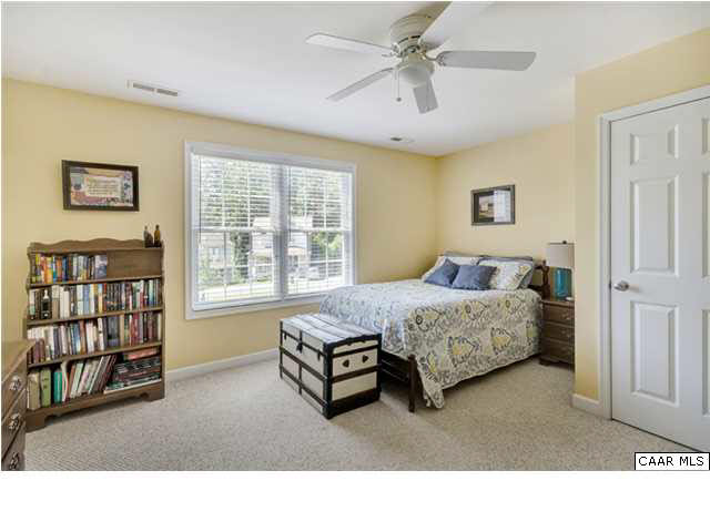 128 Roy's Place Charlottesville, VA 22902 - Photo 14 of 16 a living room with a bed furniture and a window