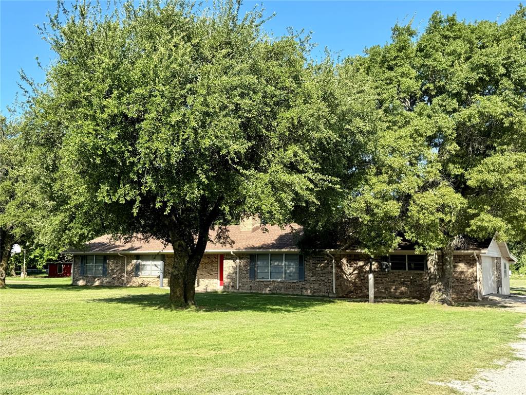4170 Farm To Market 51 Decatur, TX 76234 - Photo 20 of 36 a front view of a house with a yard