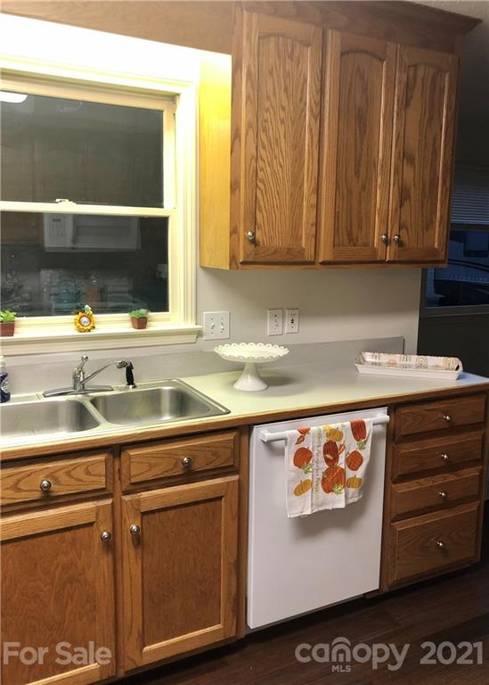 980 Coventry Road Kannapolis, NC 28081 - Photo 11 of 32 a view of a kitchen with a sink and a stove top oven