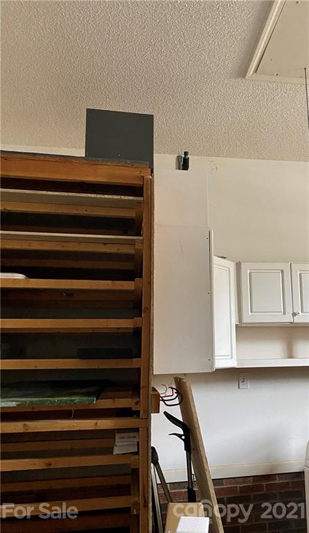 980 Coventry Road Kannapolis, NC 28081 - Photo 30 of 32 a living room with couch and a fireplace