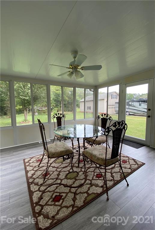 980 Coventry Road Kannapolis, NC 28081 - Photo 7 of 32 a dining room with furniture and a large window