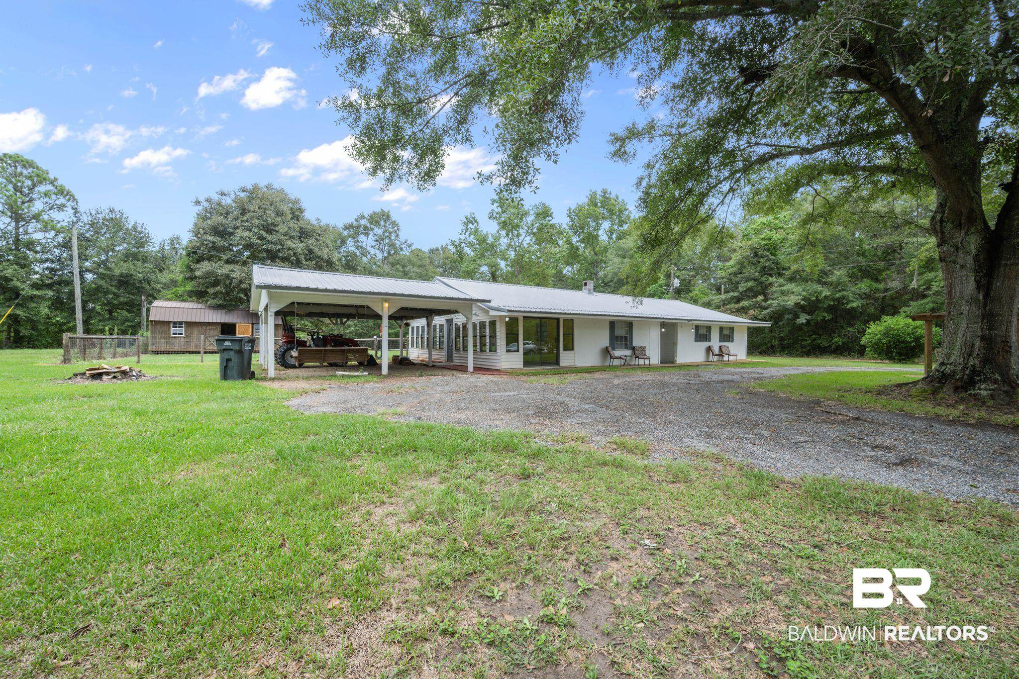 54855 Ramer Drive Bay Minette, AL 36507 - Photo 5 of 20 View of front of home with a carport, a porch, and a front yard