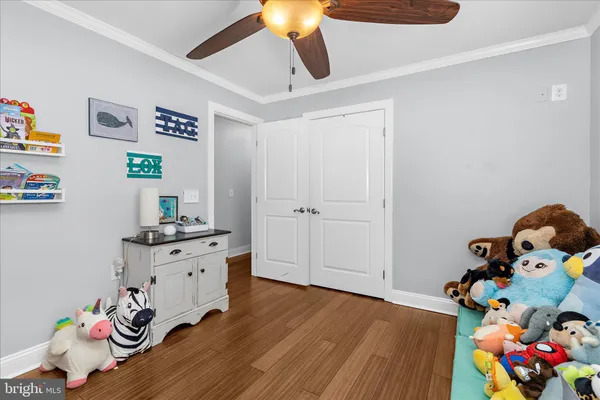 a room with toys and wooden floor