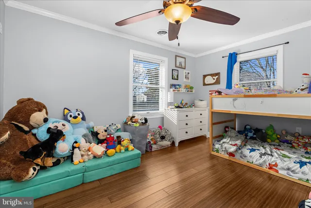 a bed room with furniture and a window