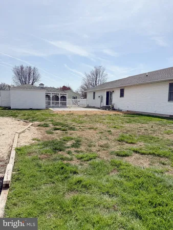 a house view with garden space