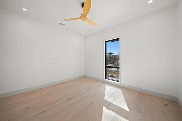 an empty room with windows