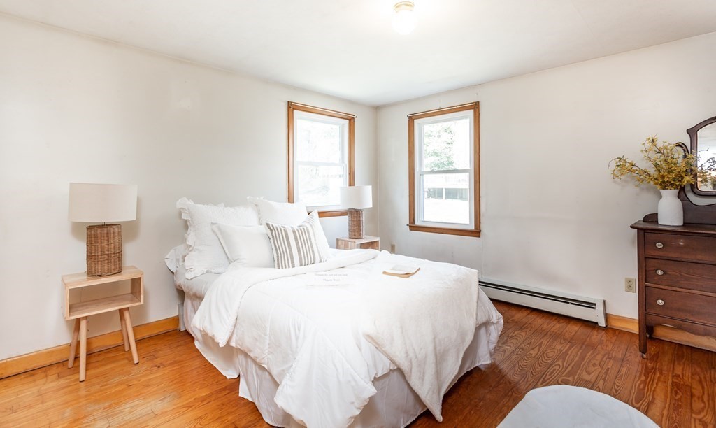 159 Hathaway Road Acushnet, MA 02743 - Photo 12 of 18 a bedroom with a bed and a window