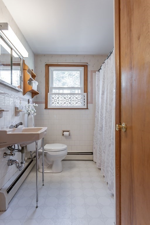 159 Hathaway Road Acushnet, MA 02743 - Photo 15 of 18 a bathroom with a sink and a mirror