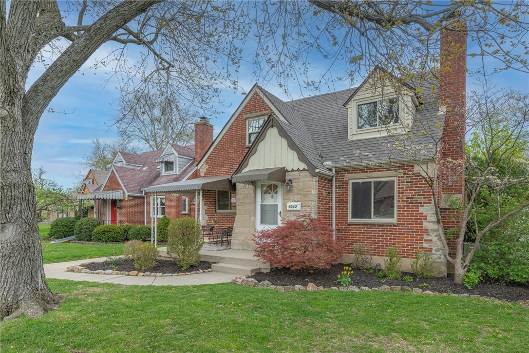 1012 Hampshire Road Dayton, OH 45419 - Photo 2 of 39 This charming brick home features mature trees and an inviting covered porch.