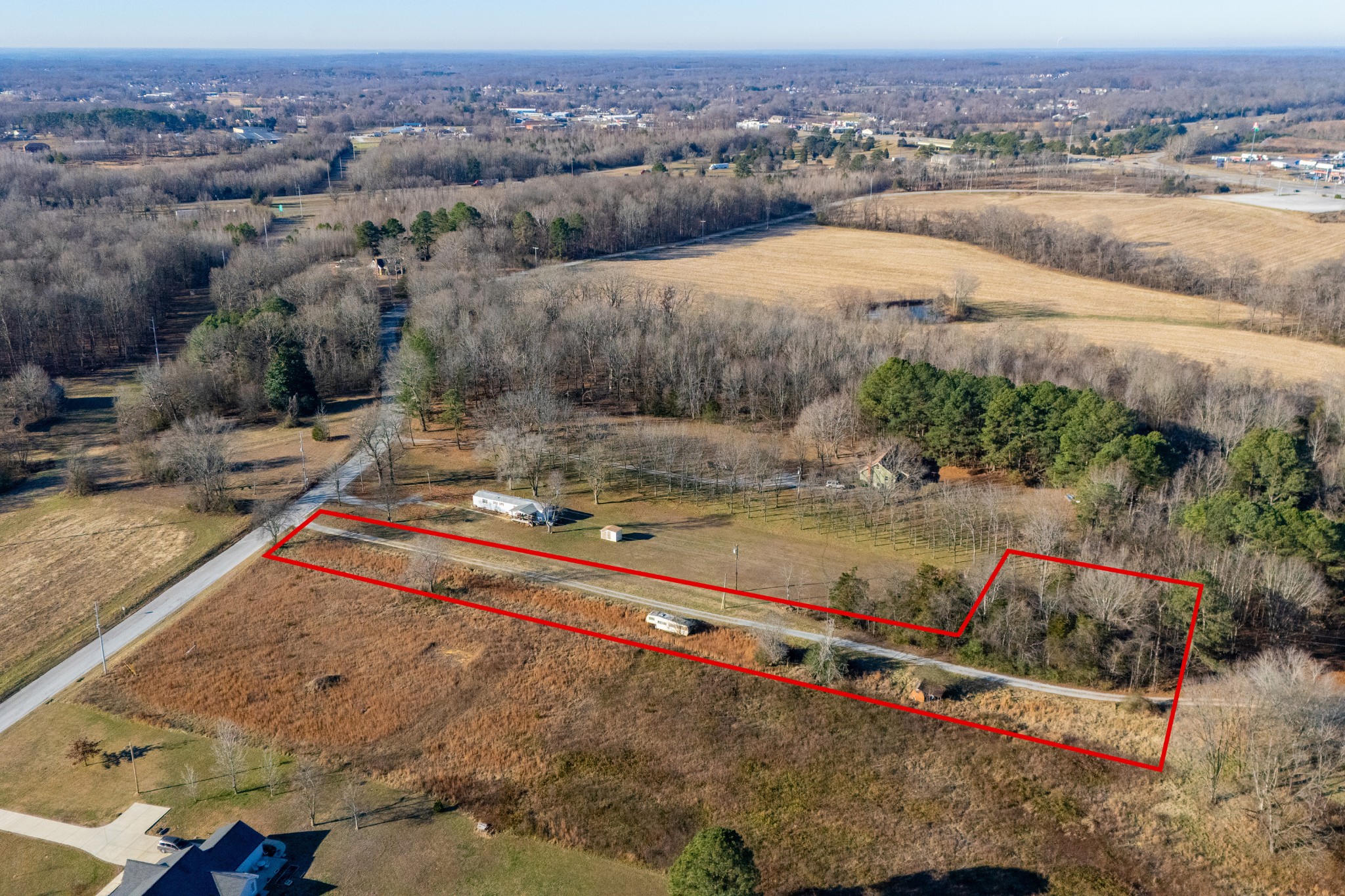 2854 Joe Dowlen Road Pleasant View, TN 37146 - Photo 9 of 12 an aerial view of a house with a yard and lake view