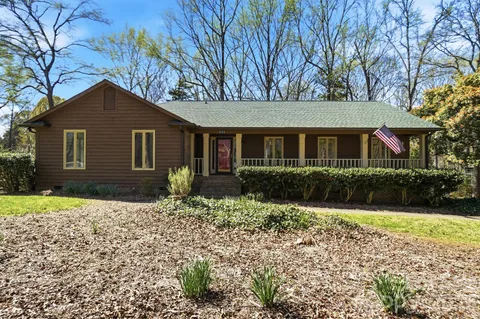 a house with a tree in front of it