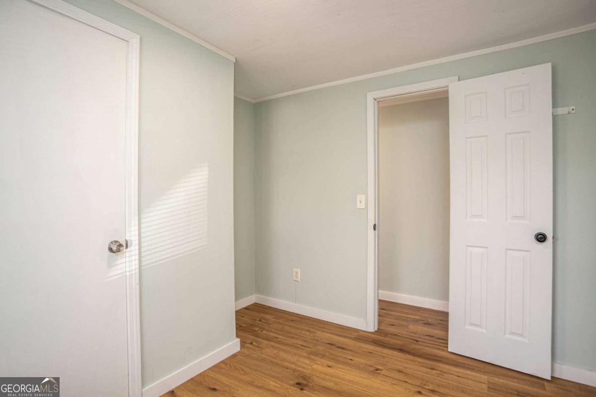 139 Anglin Road Jefferson, GA 30549 - Photo 18 of 26 a view of room with wooden floor