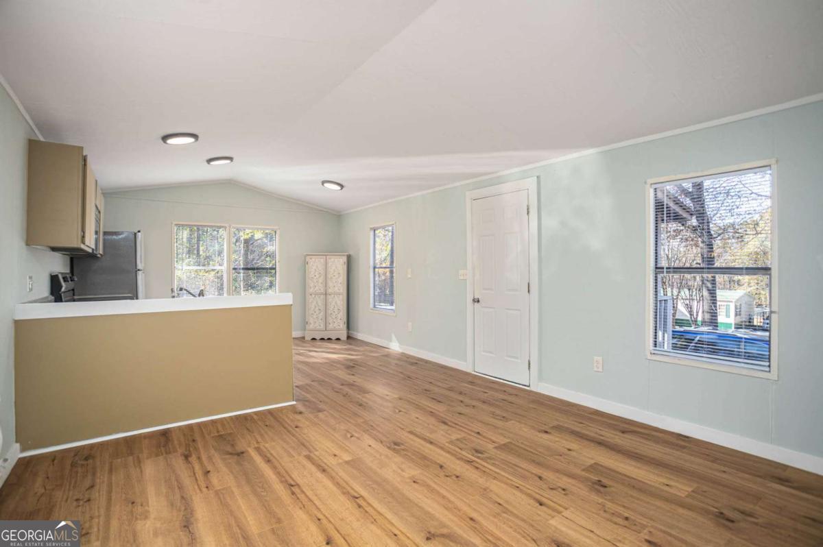 139 Anglin Road Jefferson, GA 30549 - Photo 4 of 26 a view of kitchen and wooden floor
