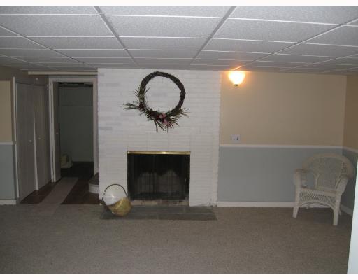 3424 Diamond Hill Road Cumberland, RI 02864 - Photo 8 of 8 Den/Family/Great Room. Lower-level family room / side with fireplace
