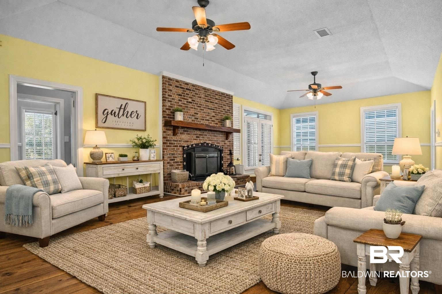7650 Iron Rush Road Wilmer, AL 36587 - Photo 8 of 34 Living Area Virtually Staged with wood flooring, vaulted ceiling, ceiling fan, a brick fireplace, and a textured ceiling
