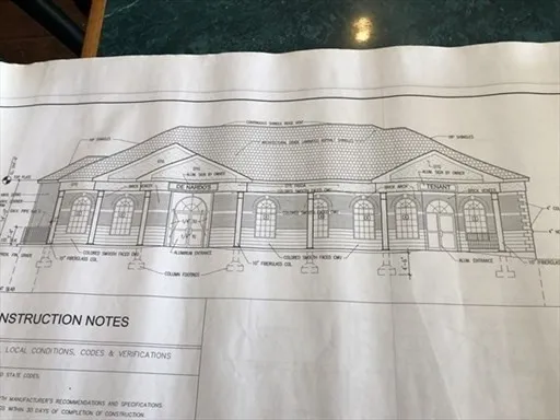 a picture of a bathroom with a sink and a window