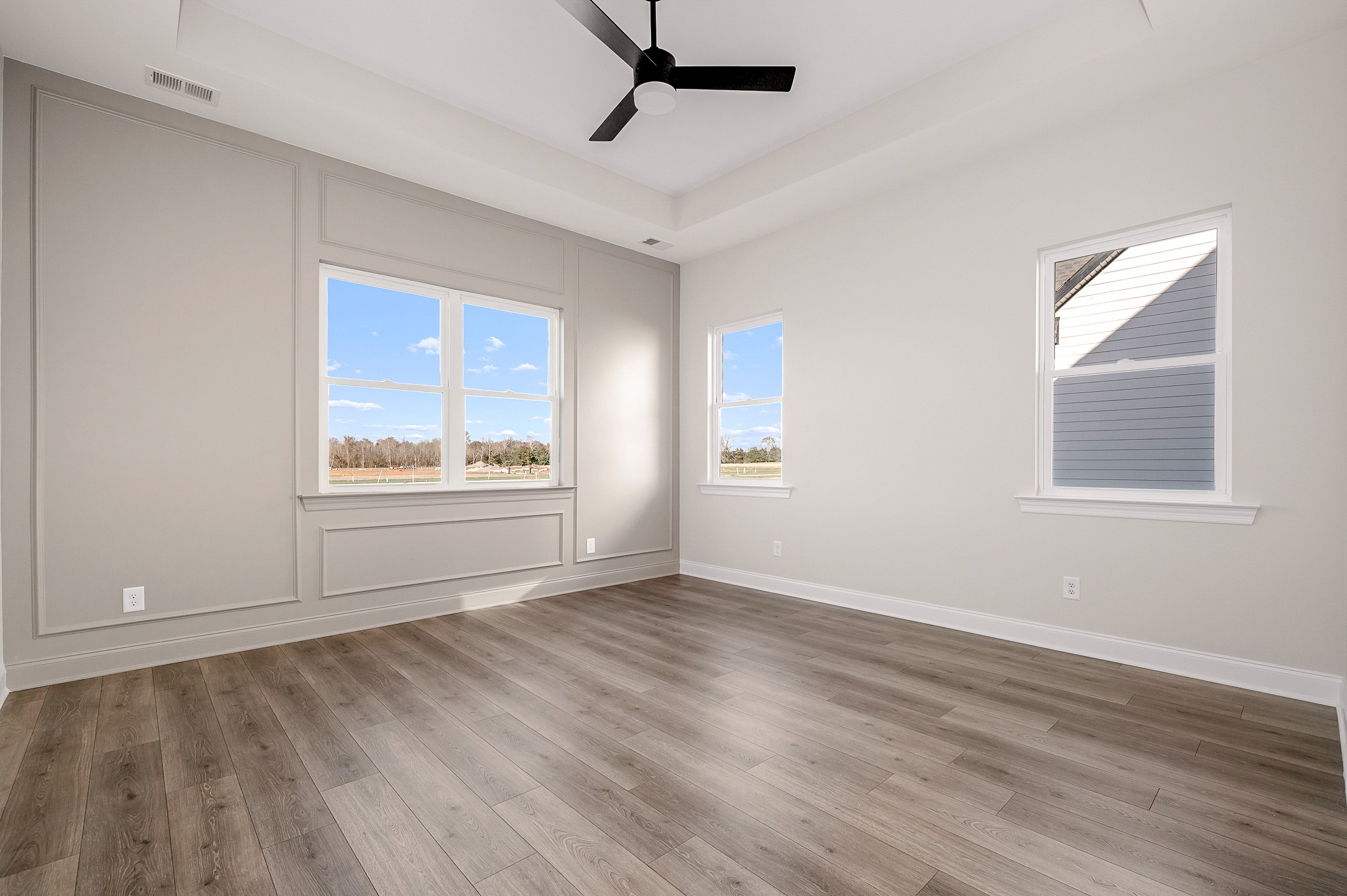 4209 McCown Way Murfreesboro, TN 37127 - Photo 12 of 29 a view of an empty room with a window and wooden floor