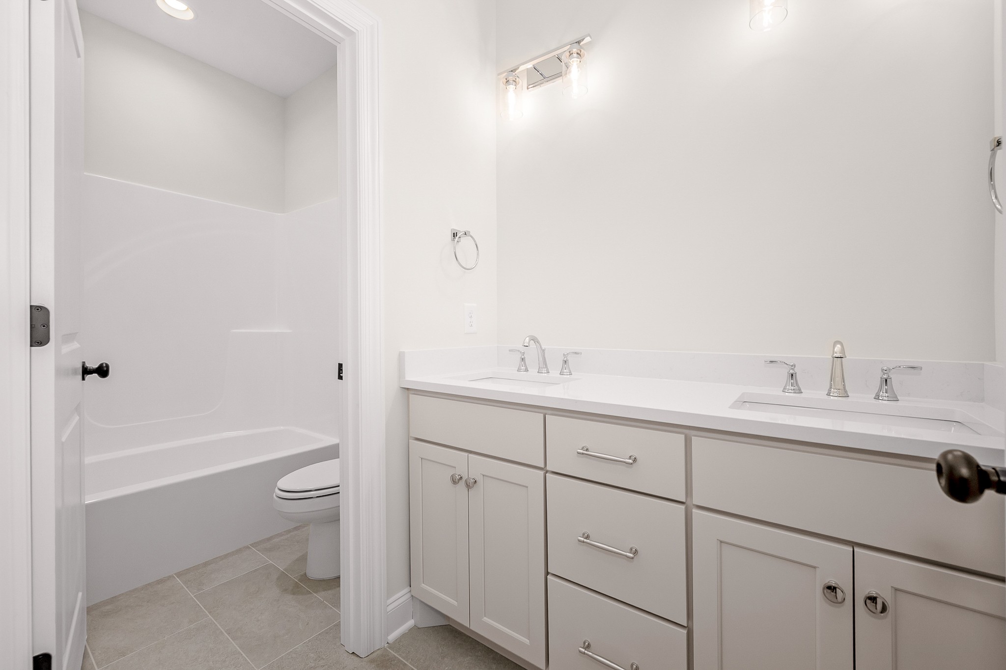 4209 McCown Way Murfreesboro, TN 37127 - Photo 25 of 29 a bathroom with a toilet a sink a tub and mirror