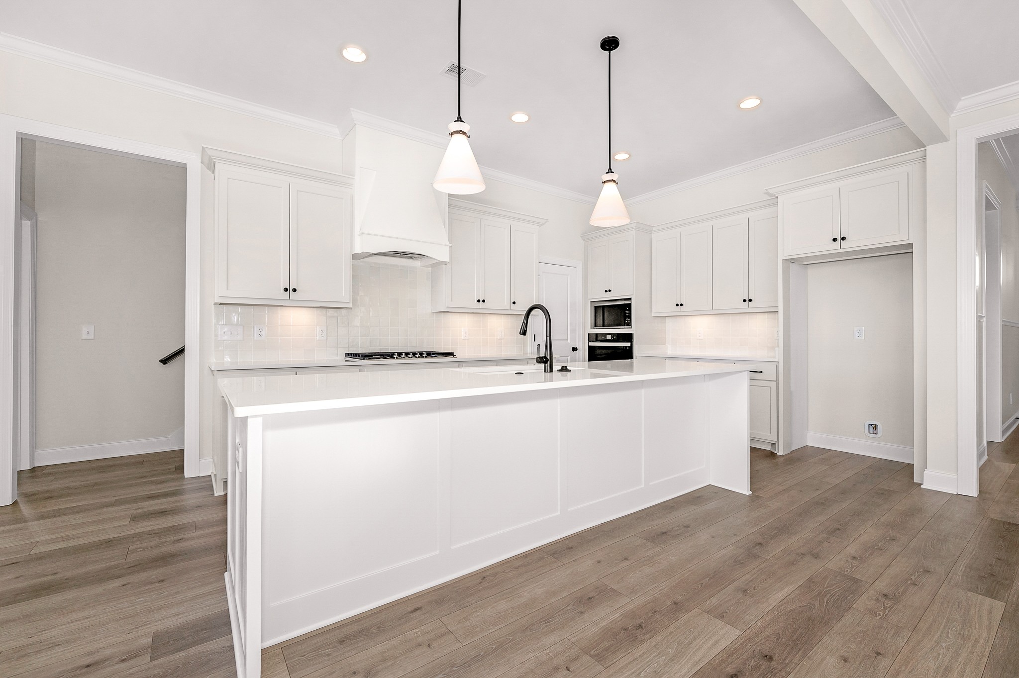 4209 McCown Way Murfreesboro, TN 37127 - Photo 9 of 29 a kitchen with kitchen island a sink a center island stainless steel appliances and cabinets