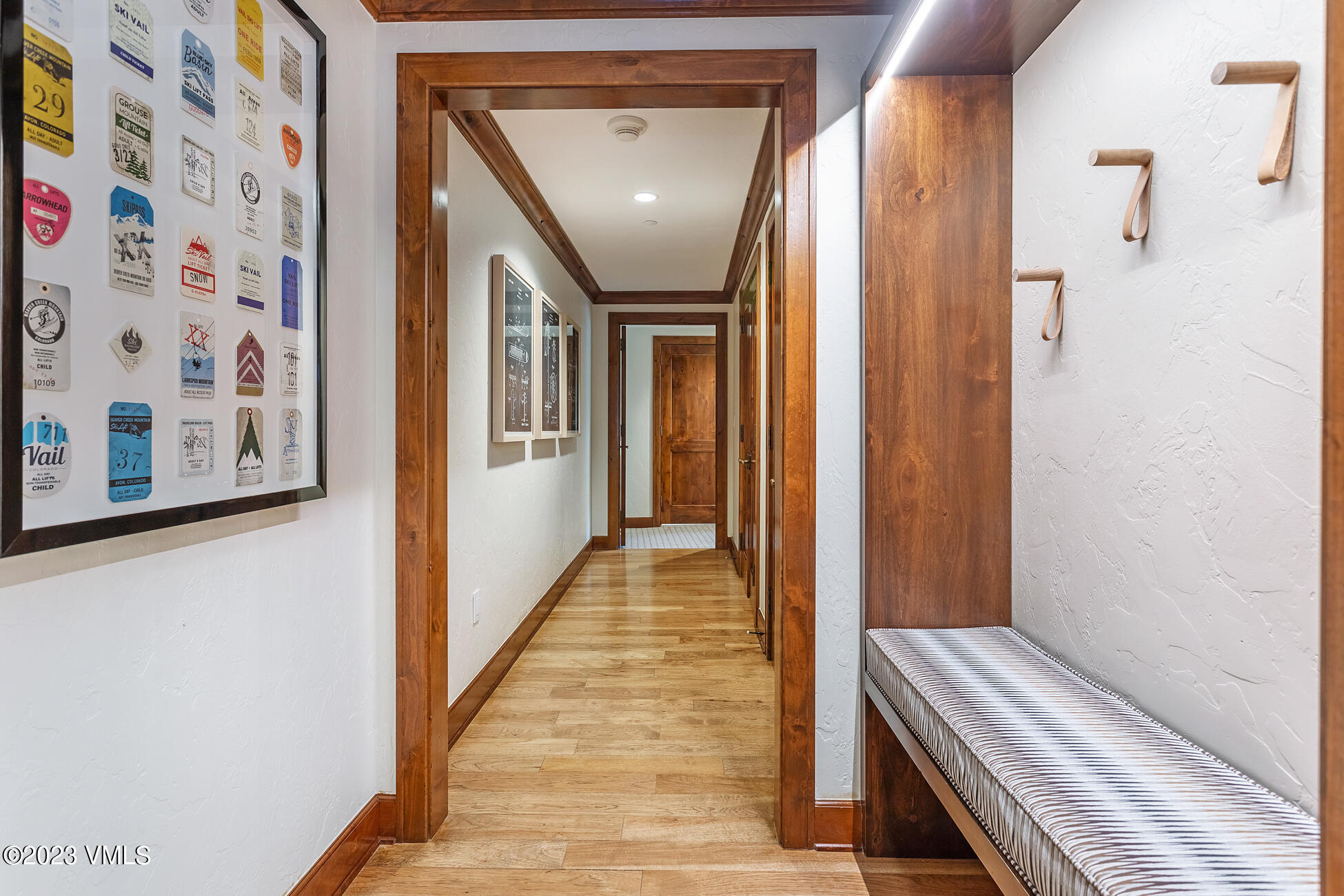 100 Bachelor Ridge Road, Unit 3214 Avon, CO 81620 - Photo 24 of 38 a view of a hallway with wooden floor and entryway