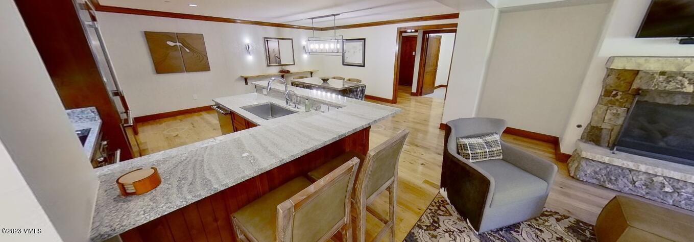 100 Bachelor Ridge Road, Unit 3214 Avon, CO 81620 - Photo 38 of 38 a living room with furniture and a flat screen tv