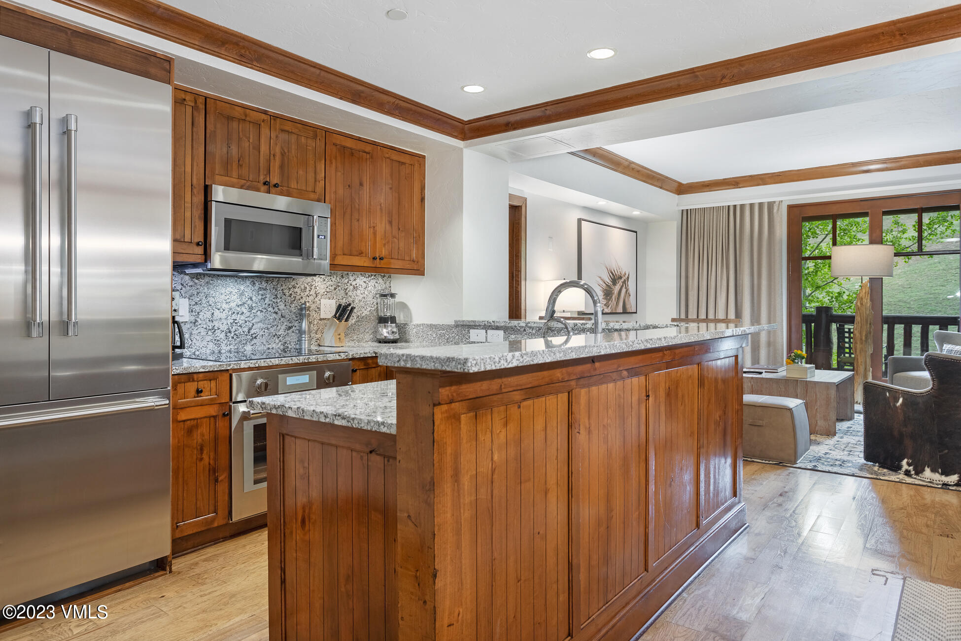 100 Bachelor Ridge Road, Unit 3214 Avon, CO 81620 - Photo 8 of 38 a kitchen with stainless steel appliances granite countertop a sink stove and refrigerator