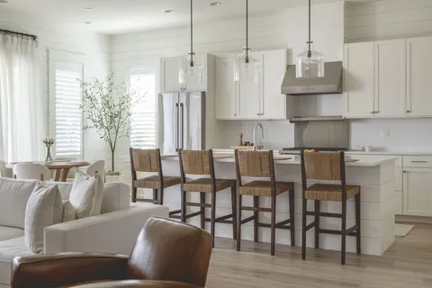 a view of kitchen with furniture and wooden floor