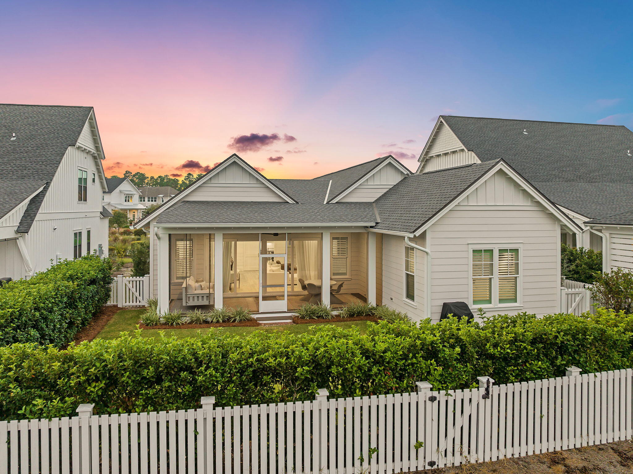 133 Heartwood St Inlet Beach Inlet Beach, FL 32461 - Photo 7 of 20 Image #7 | Backyard exterior at sunset