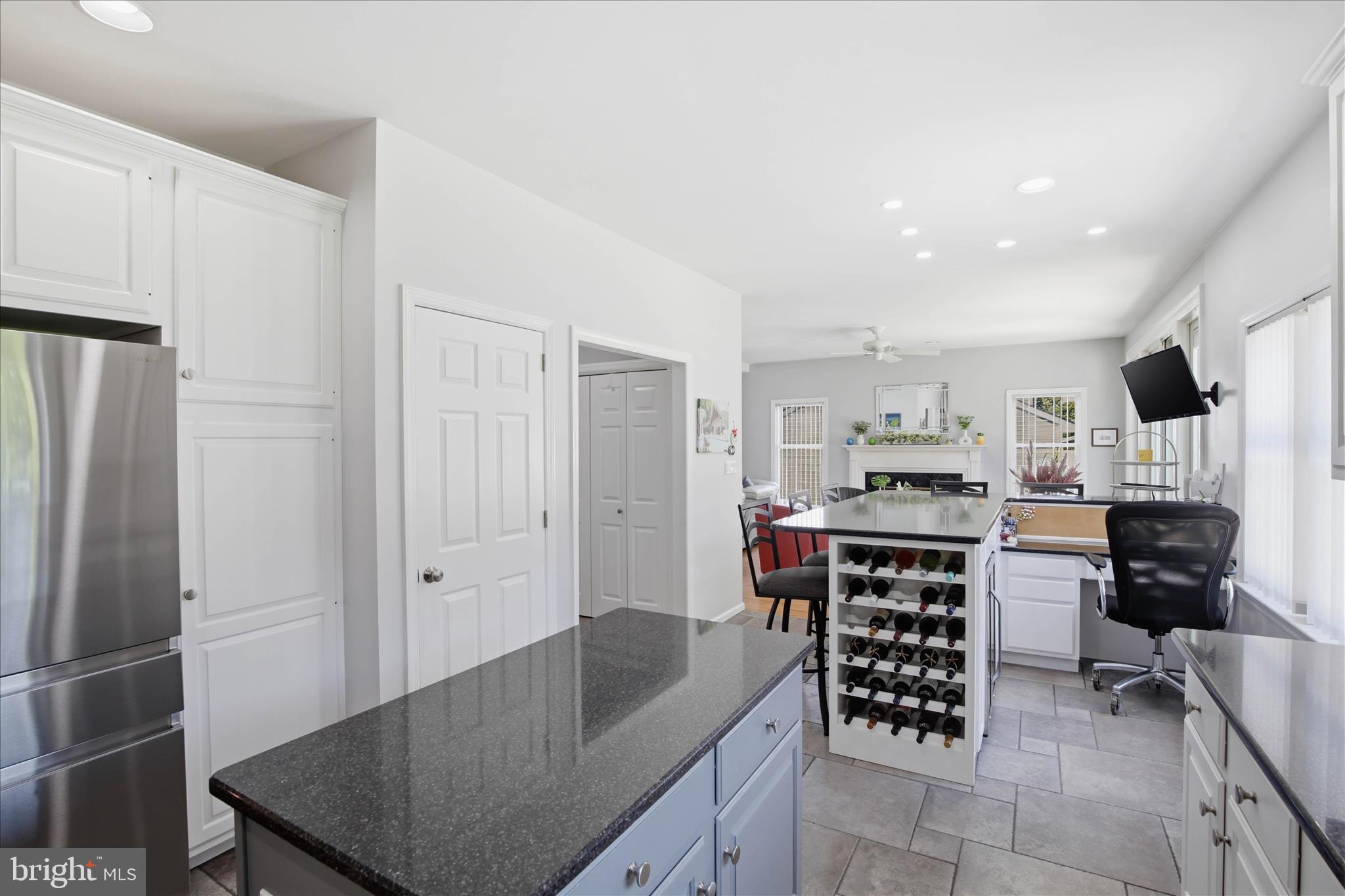 725 Oxford Road Lancaster, PA 17601 - Photo 14 of 46 a kitchen with stainless steel appliances a table and chairs in it