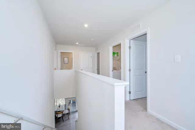 a bedroom with a bed and a storage