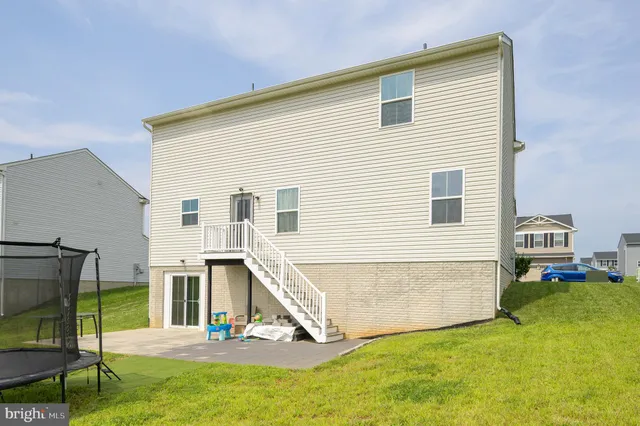 a view of a house with a swimming pool