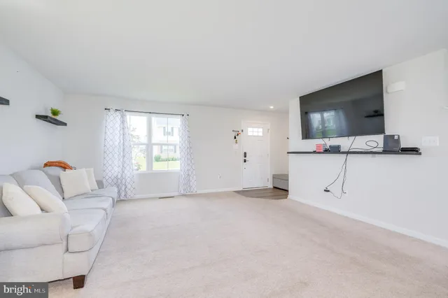 a workspace with furniture and window