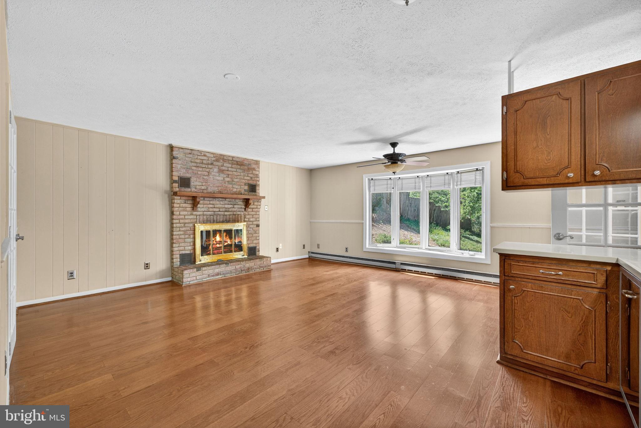 107 Roszel Road Winchester, VA 22601 - Photo 15 of 87 Wood burning Fireplace in kitchen