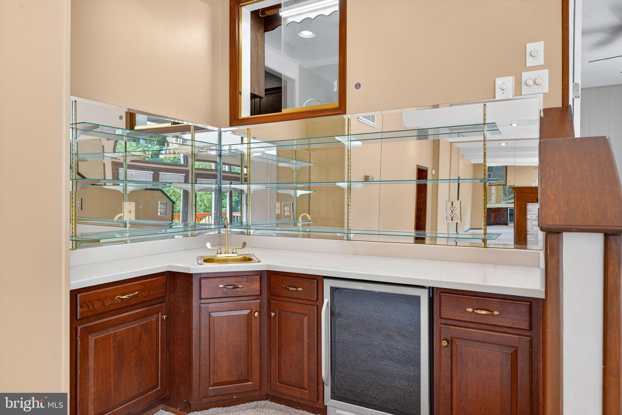 107 Roszel Road Winchester, VA 22601 - Photo 28 of 87 Wet Bar in lower level with pass-through window