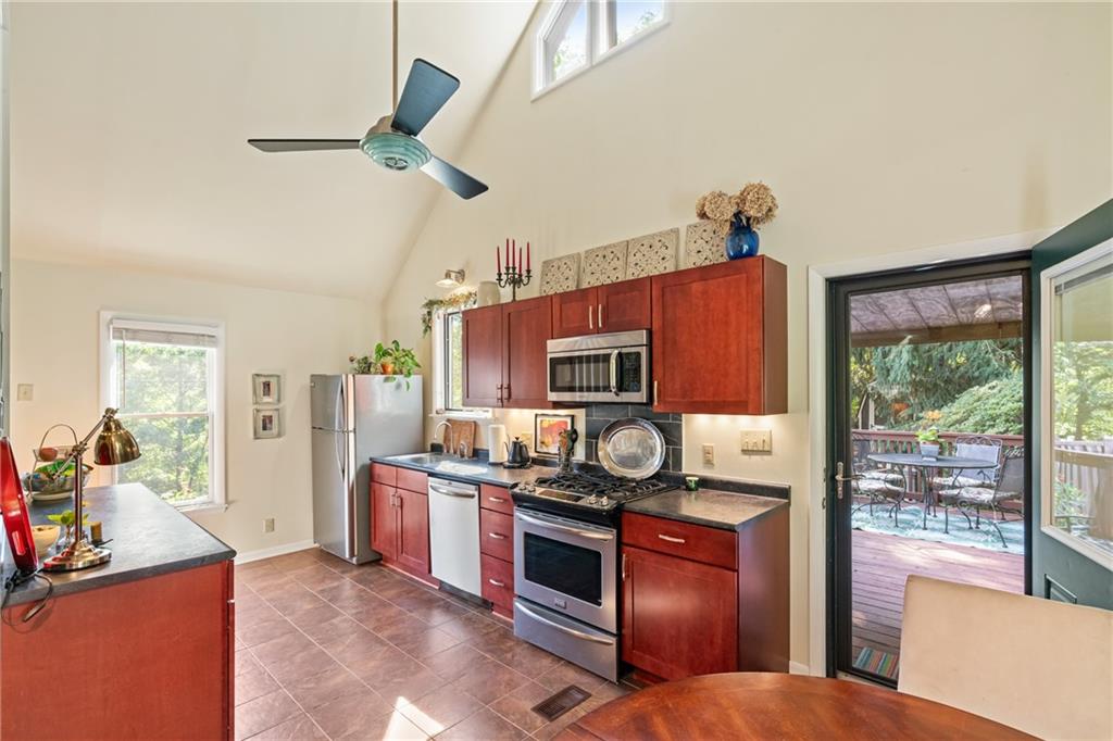 403 Filmore Road Pittsburgh, PA 15221 - Photo 14 of 35 Contemporary kitchen with vaulted ceiling.